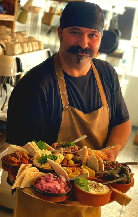 Chef Kerim with a meze platter